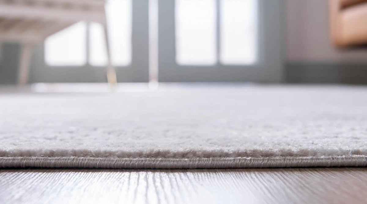 9' x 12' Ivory Low-Pile Rug U7581